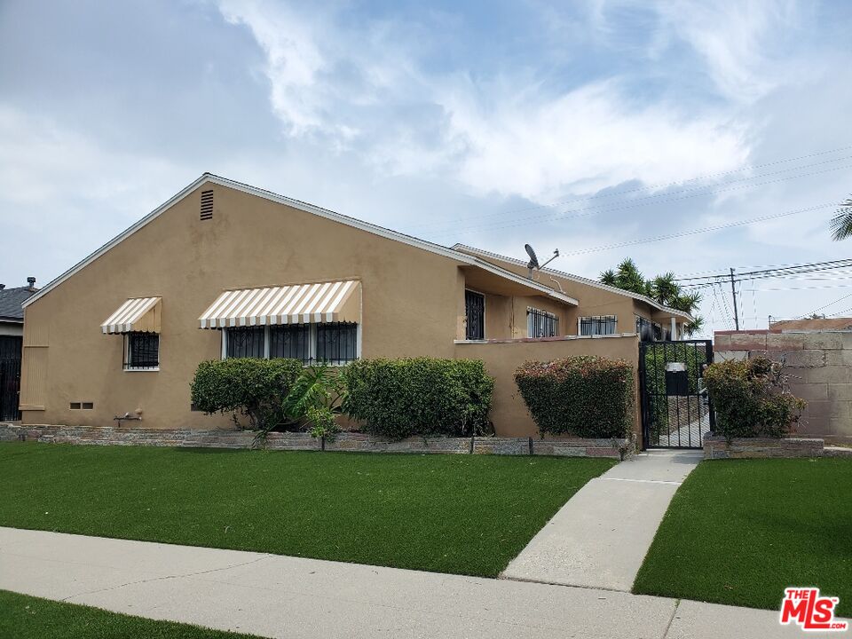 Property photo for 9424 S Manhattan Pl, Los Angeles, CA