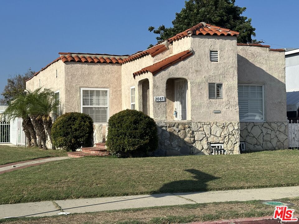 Property photo for 2067 W 65th Pl, Los Angeles, CA